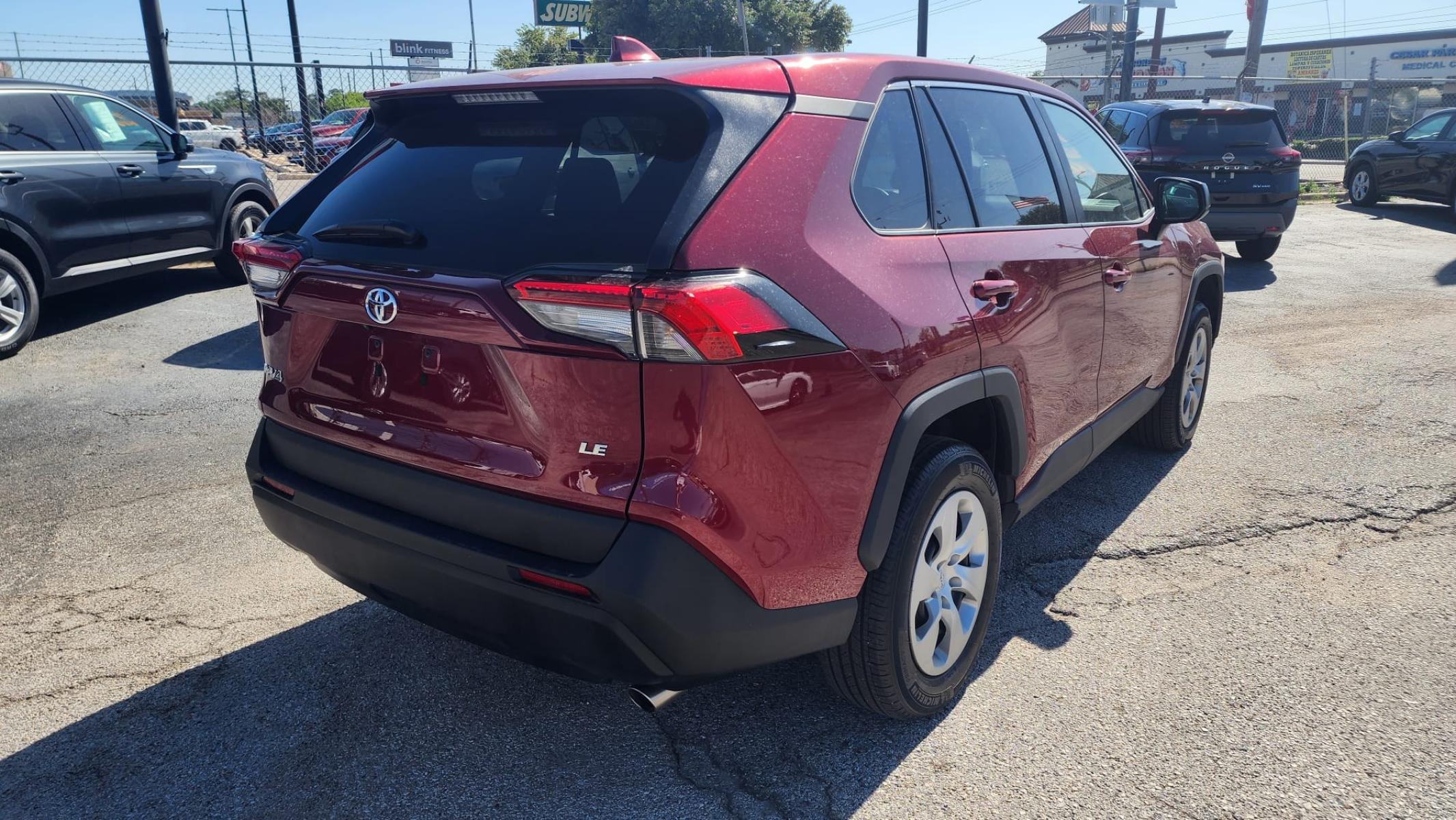 2023 Red Toyota RAV4 LE (2T3H1RFV9PW) with an 2.5L L4 DOHC 16V engine, 8A transmission, located at 1842 Wirt Road, Houston, TX, 77055, (713) 973-3903, 29.805330, -95.484787 - Photo #3